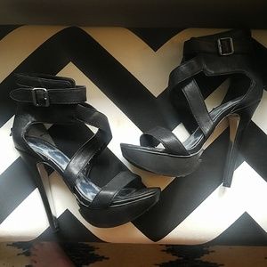 Bebe stilettos black leather size7